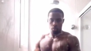 muscular black stallion in shower