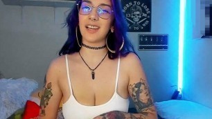 Beautiful and sensual otaku girl with glasses, big natural tits and purple hair loves to express her sexuality online