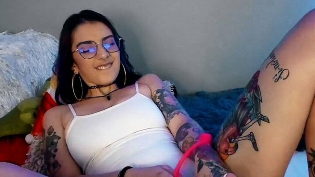 Sexy Colombian otaku with a tattooed body, big tits and a slutty face masturbates intensely with a dildo while moaning
